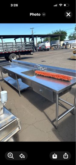 Stainless steel table with sink