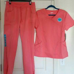 BRAND NEW SCRUBS. PEACH COLOR
