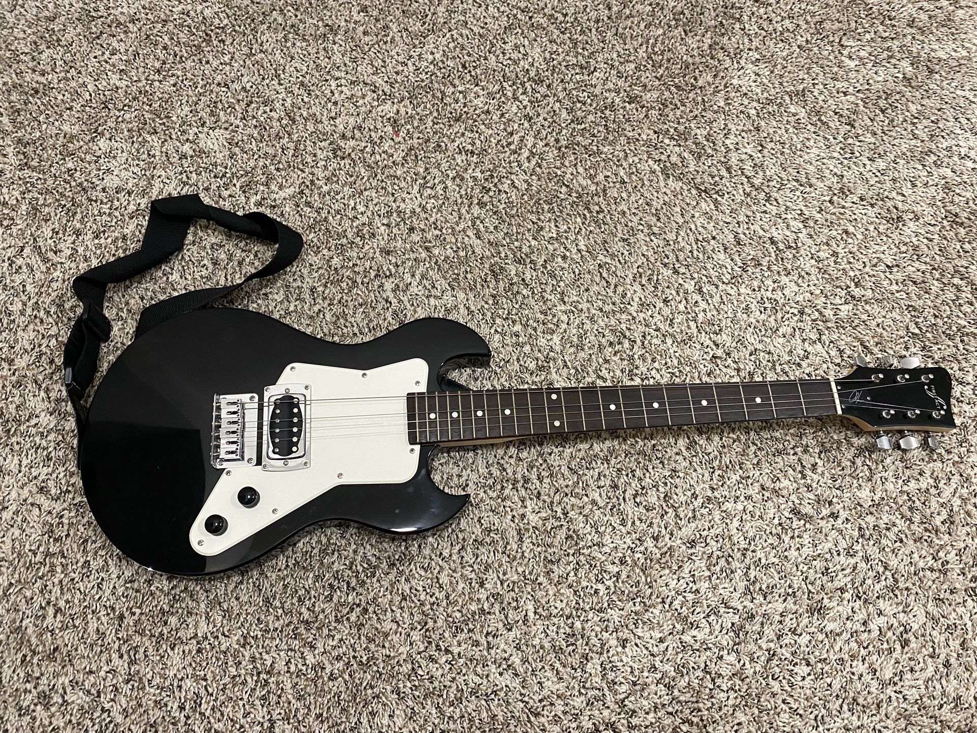First Act Adam Levine Signature Guitar 2 strings missing. Local pick up only.