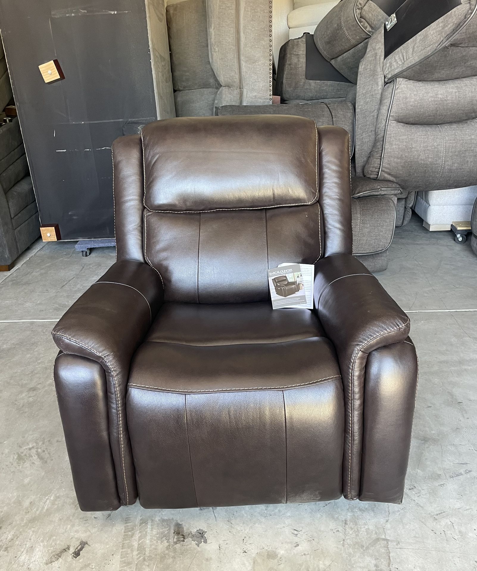 LEATHER POWER ROCKER RECLINER WITH POWER ADJUSTABLE HEADREST