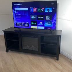 Tv And Tv Stand With Built In Heater