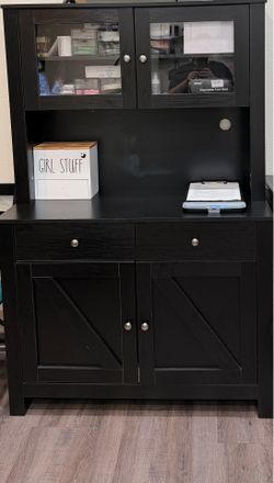 Pantry cabinet with microwave shelf