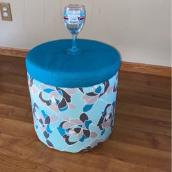 Storage ottoman and wine glass