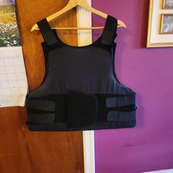WEIGHTED PROTECTIVE KEVLAR VEST.