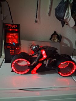 Tron Ares Light cycle popcorn bucket  a limited edition light -up  collectible,  released by major movie theaters...  and  Tron Ares Arcade  Light up 