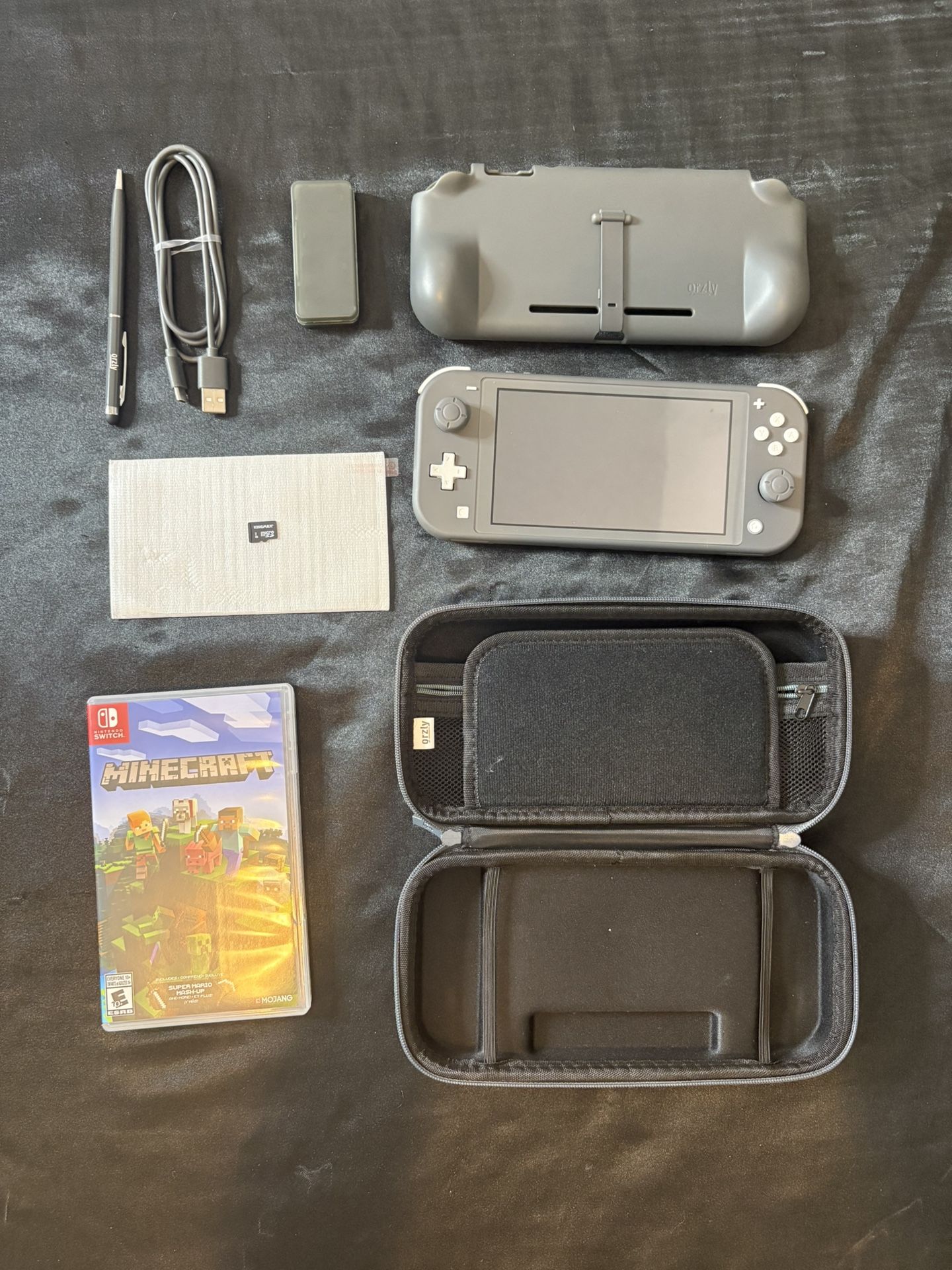 Nintendo switch lite with game and case
