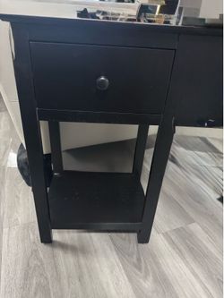 Two side tables in black