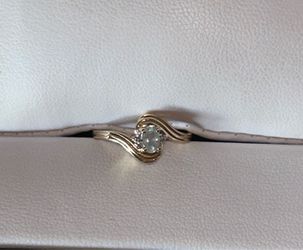 14 karat gold ring size6 with 1/2 karat real aquamarine stone