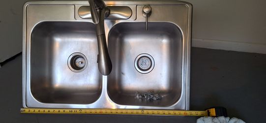 Double kitchen sink with Kitchen faucet and food disposal hook up