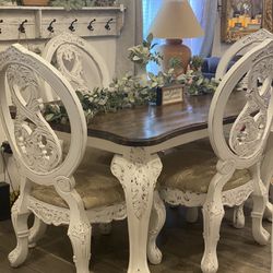 Gorgeous french country table w/4 chairs  60in. W x 42in. D x 31in. H