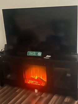 Electric fireplace and TV stand