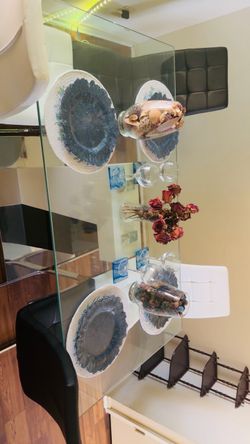 Glass Dining Table with Decorative Centerpieces