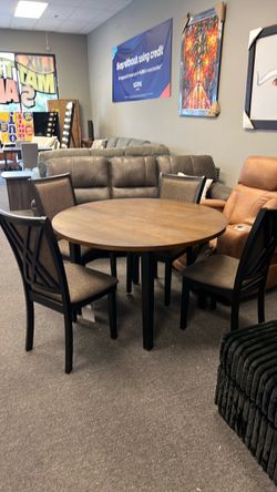 Beautiful rustic round table and chairs. Was $999 now $550