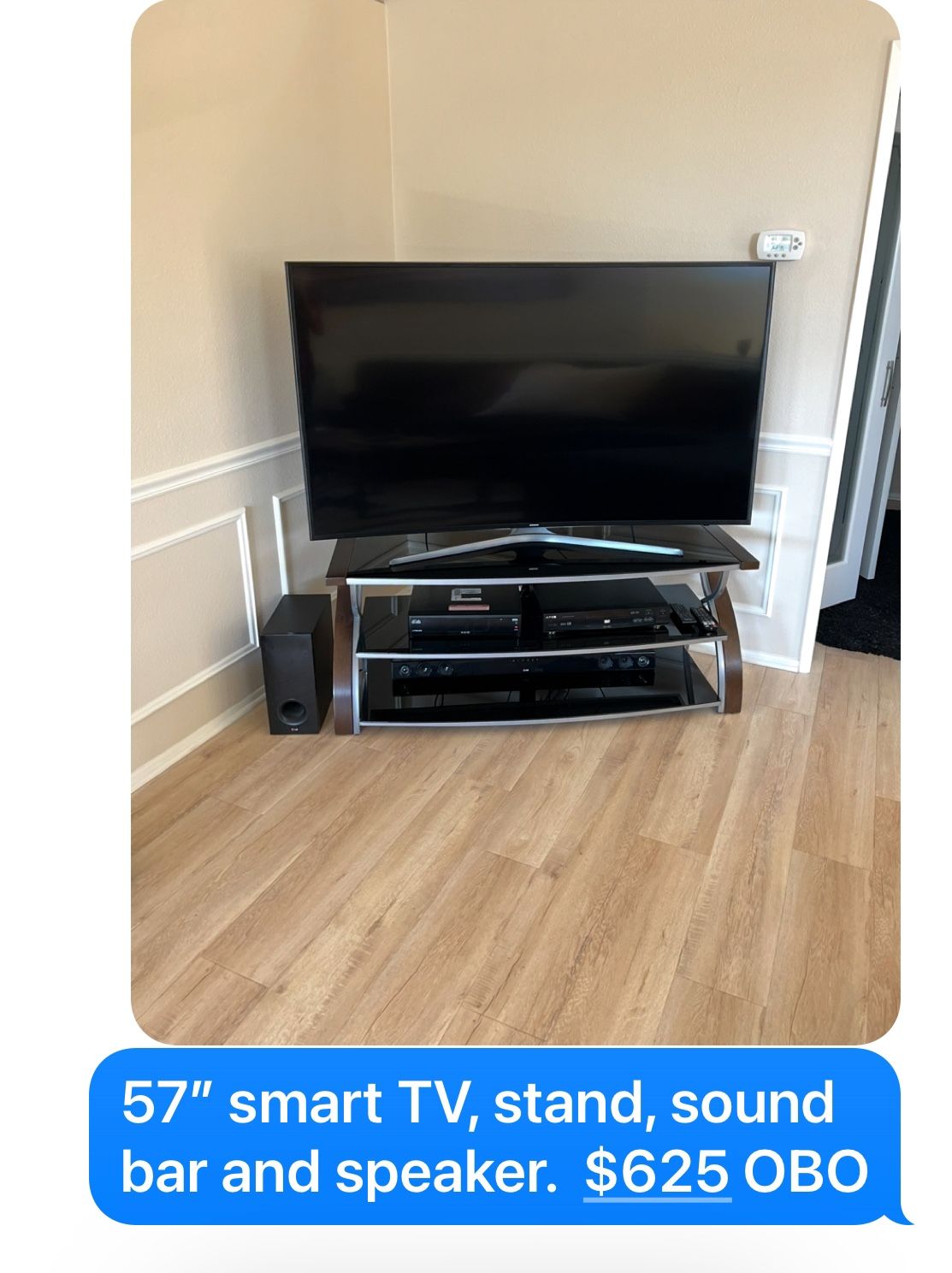 57” Smart TV With Stand And Soundbar And Speaker