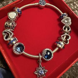 Authentic Pandora bracelet with 13 charms