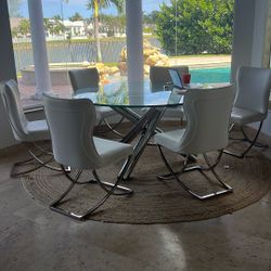 A60 Inch Round Glass And Chrome Dining Table With5 White And Chrome Chairs.   Bonus 6.chair