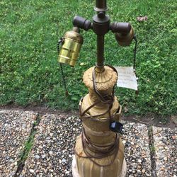 Authentic Cast iron railroad car lamp original paint and brass works perfect Heavy cast iron  2’T Base 7 1/2 round   Will not reply to scammers   Pick
