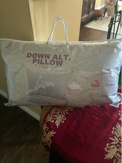 Pair of new down pillows