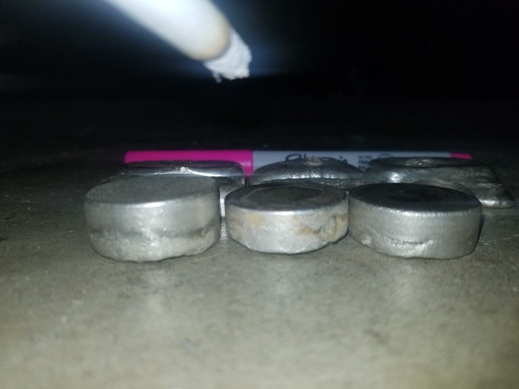 Hand Smelted Silver Bars And Cylinders