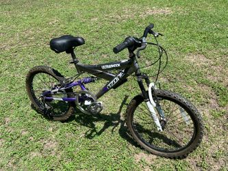 Ozone 500 Ultra Shock 20-inch bicycle, a 7-speed mountain bike