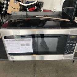 GE 2.0 cu. ft. 1200-Watt Countertop Microwave in Black Stainless Steel