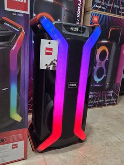 Portable and Rechargeable Speaker with Bluetooth and Party Lights! Microphone included.