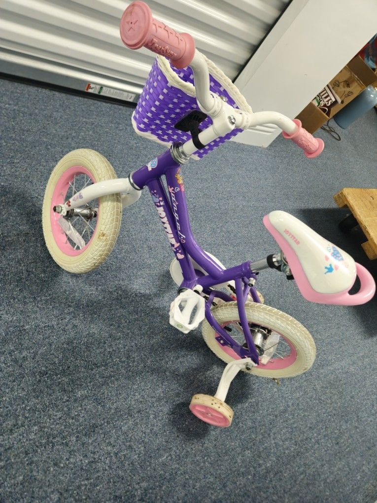 Girls 12" bike with training wheels ..recommended for ages 3 to 5