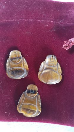 2 hand carved tigers eye Buddha 15 for 2