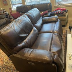 Jermones 2 Leather Loveseats that are 4 Electric Recliners 