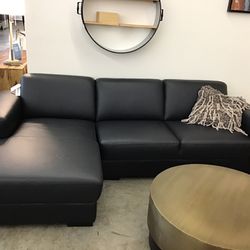 Matte Black Leather Sectional.  105” Long