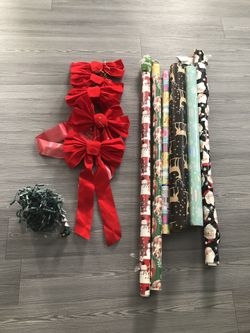electric garland, bows, and wrapping paper. all for $ 10.