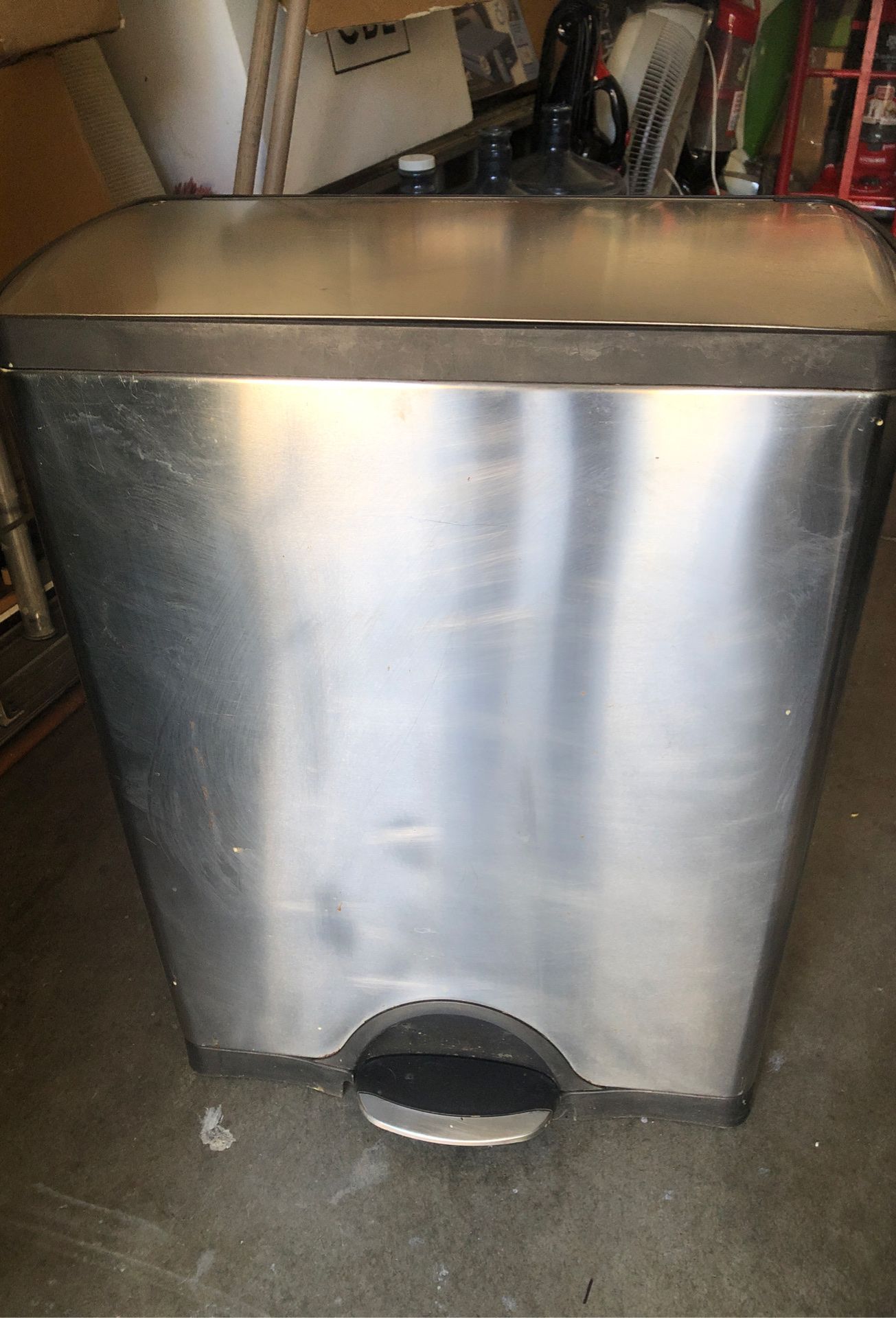 SIMPLEHUMAN Big trash can, look new. Morning need a new home. $15. Size 26” T X 19” W and 10” D.