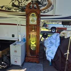 Grandfather clock Howard Miller, 2 lane, Cedar chest, one high boy.
One sixty inch, sharp flat screen, one dining oak table set anna morant.Stereo was