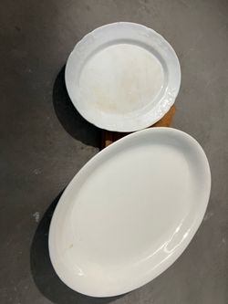 Two old white cream oval platers