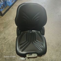 Adjustable suspension seat for mower/forklift/zero turn