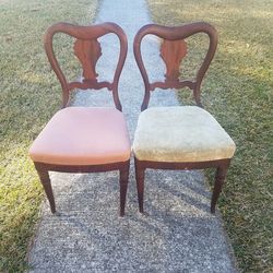 2 beautiful ladies sitting chairs