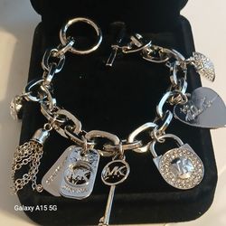 NWOT* MICHAEL KORS Silver Charm Bracelet 