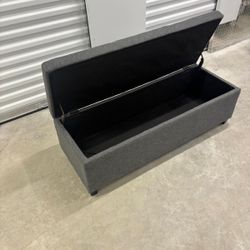 Gray storage ottoman for the front of the bed.  40” wide,18” depth, 15 1/2” .. $100
