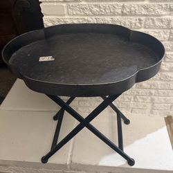 Metal Tray Table 22"x 20"x14"| Black metal tray table with a textured surface.