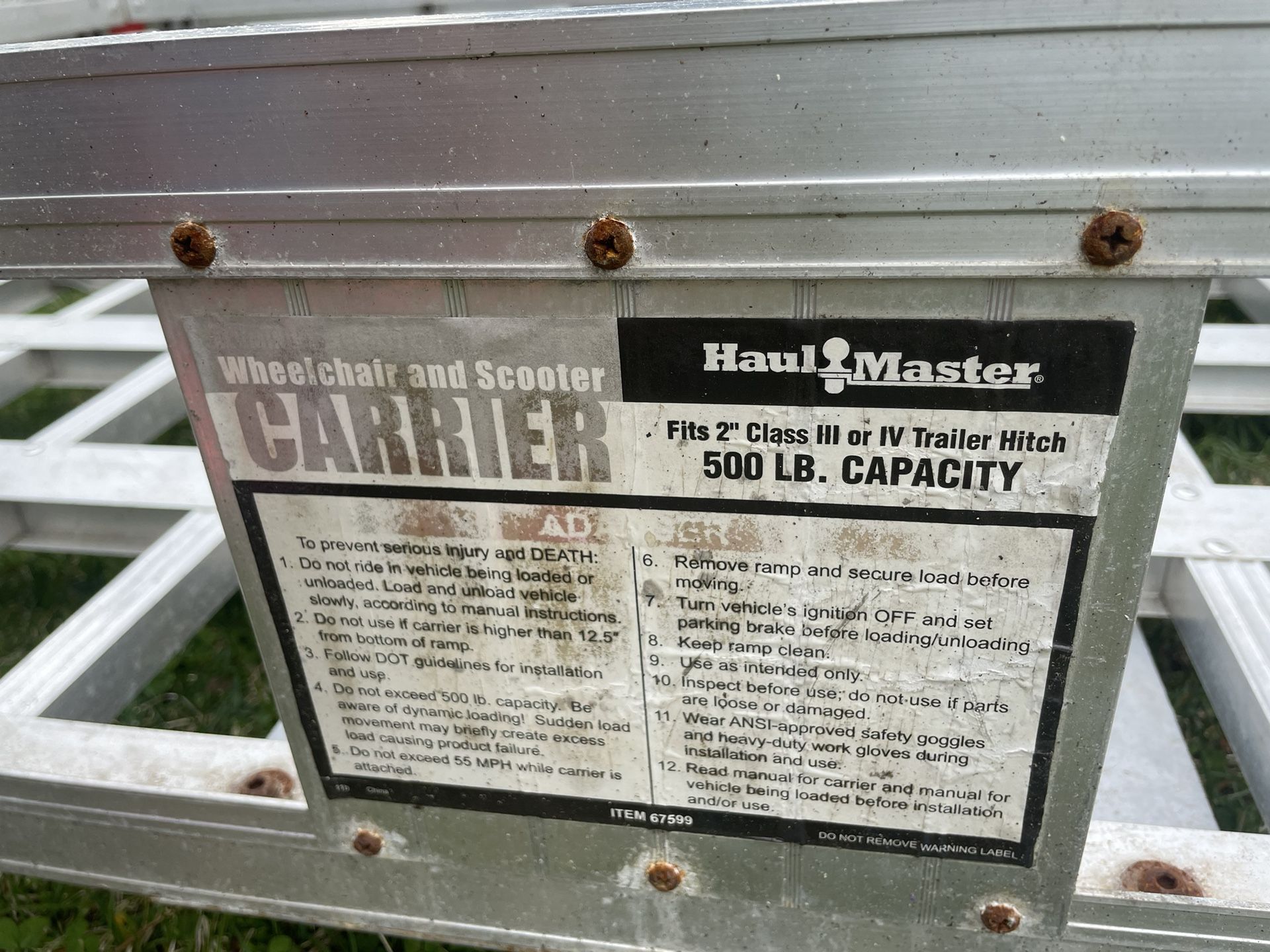 Trailer hitch, cargo carrier with ramp