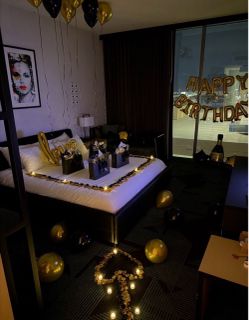 Black & gold rose petals, balloon glue, black & gold balloon strings, 292 heart stickers, and 17 white cards bundle