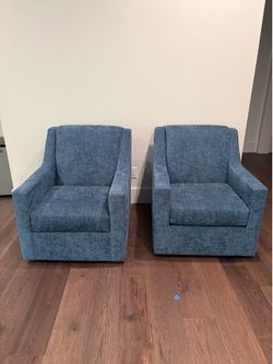 Beautiful upholstered blue swivel chairs