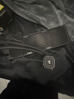240mm Corsair AIO liquid cooler, a 240mm