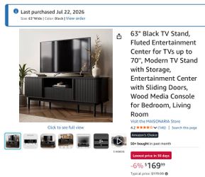 63” Black TV Stand — $110