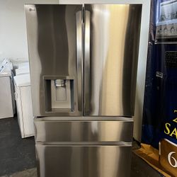 NEW OPEN BOX LG FOUR DOOR REFRIGERATOR STAINLESS STEEL 
