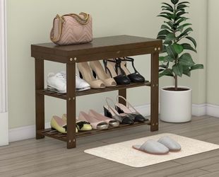 USED SHOE RACK IN WALNUT COLOR $30 Dlls ..in great condition..FIRM