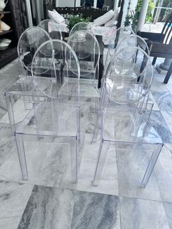 8 Acrylic ghost dining chairs