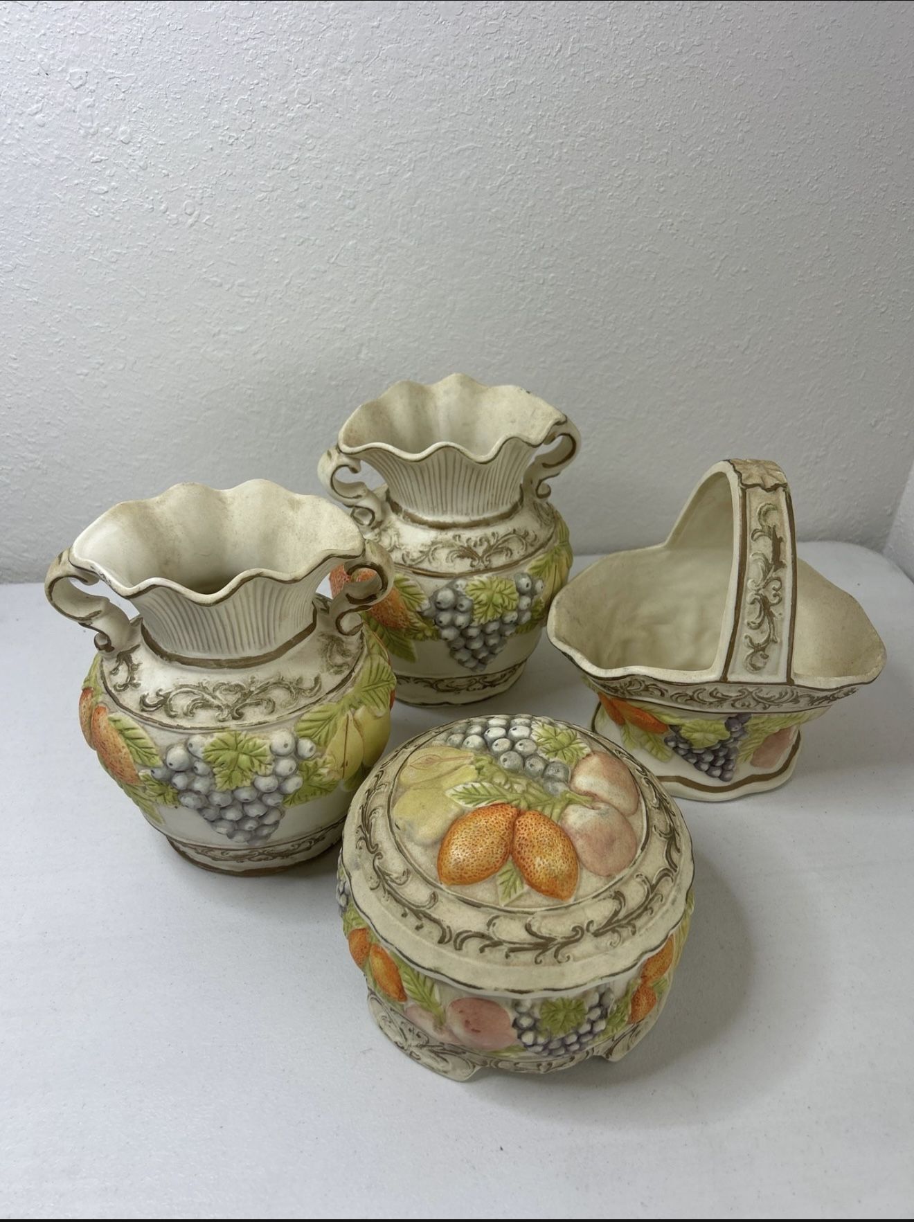 A set of decorative ceramic items.