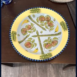 Capriware 17.5" large round ceramic serving bowl featuring a vibrant vegetable design, including tomatoes, asparagus, and peas.