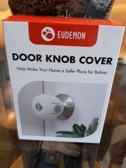 White Door Knob Covers for Baby Proofing.